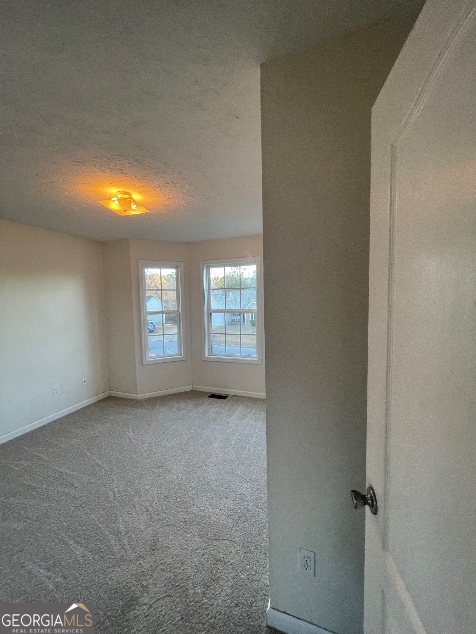 721 Meadow Spring Drive Temple, GA 30179 - Photo 32 of 43 an empty room with windows