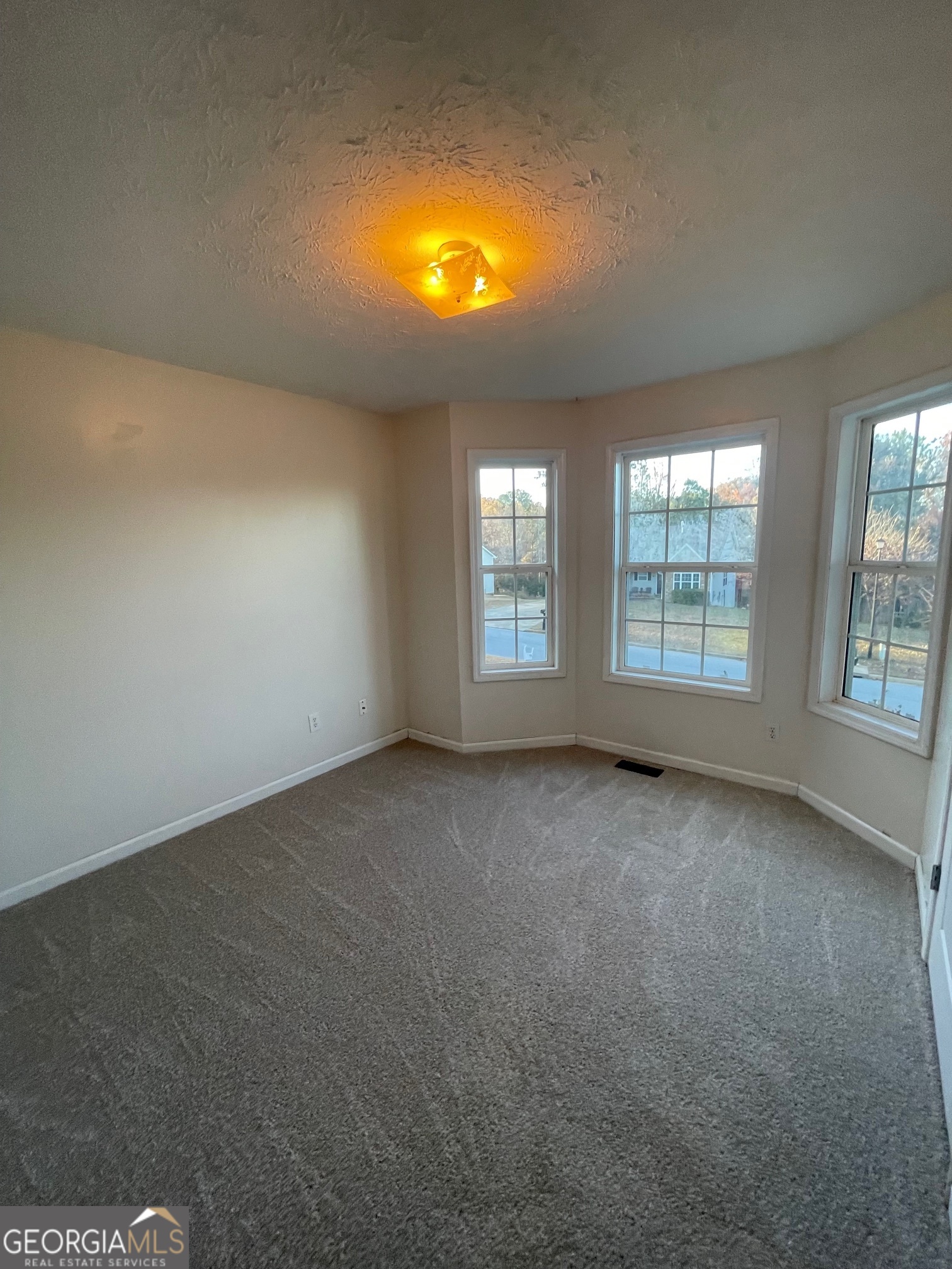 721 Meadow Spring Drive Temple, GA 30179 - Photo 33 of 43 an empty room with windows