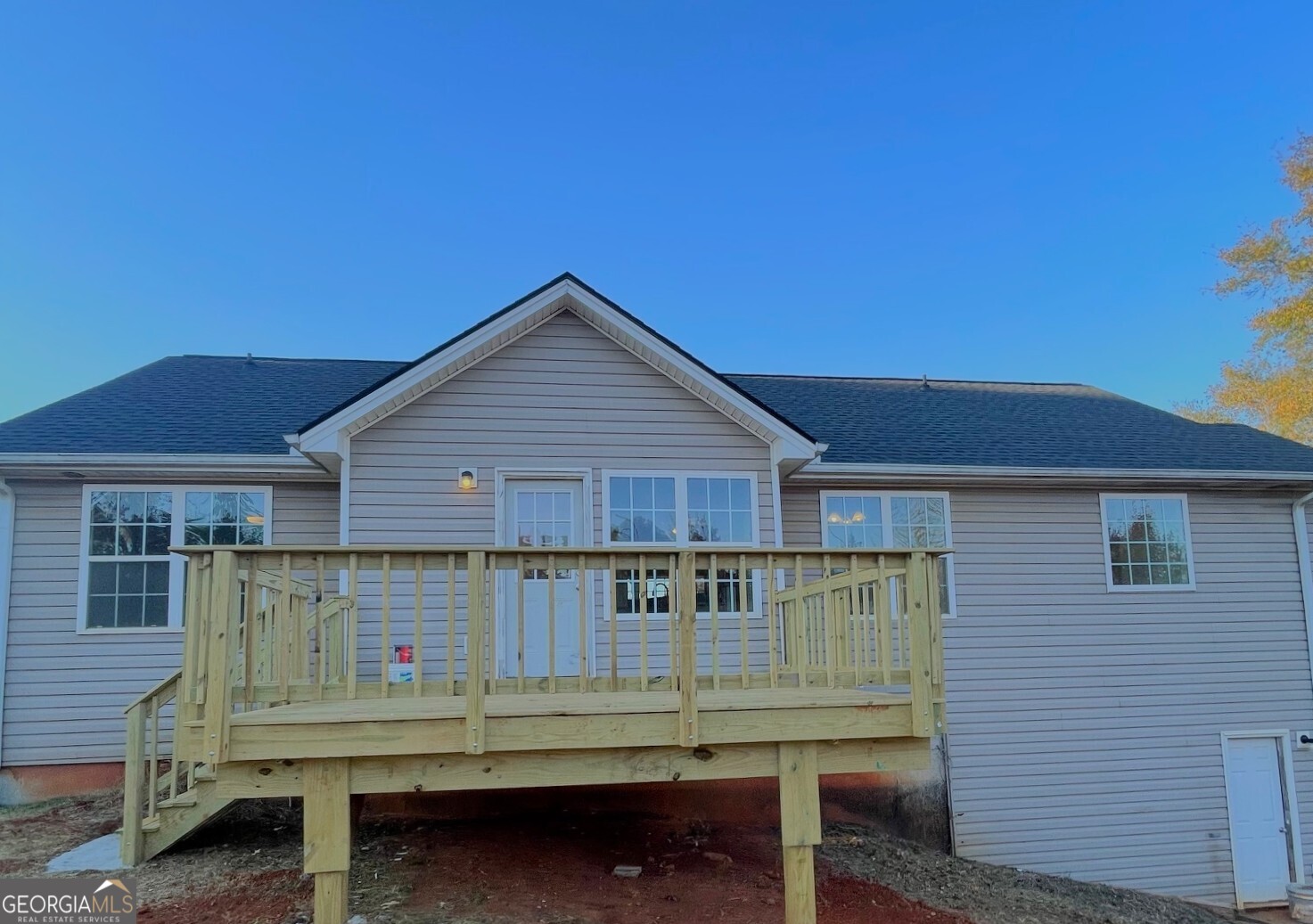 721 Meadow Spring Drive Temple, GA 30179 - Photo 43 of 43 a view of a deck with a table and chairs