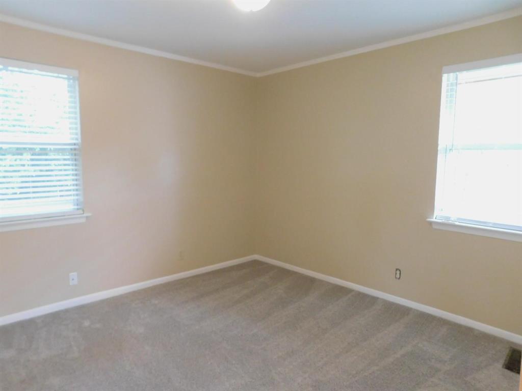 1301 Doncaster Street Irving, TX 75062 - Photo 15 of 19 an empty room with a window