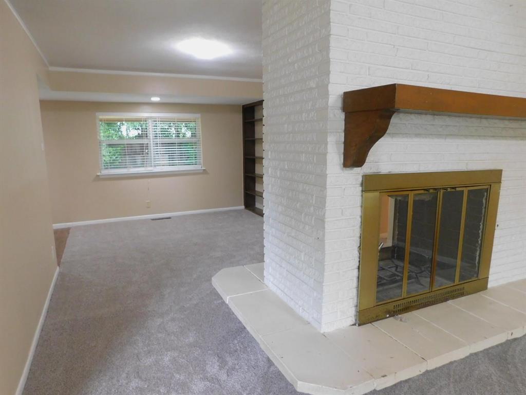 1301 Doncaster Street Irving, TX 75062 - Photo 4 of 19 a view of an empty room with a window