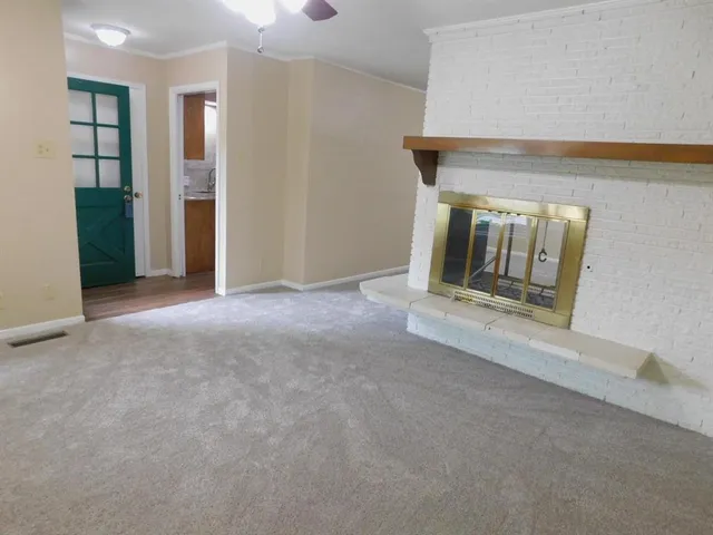 a view of empty room with front door