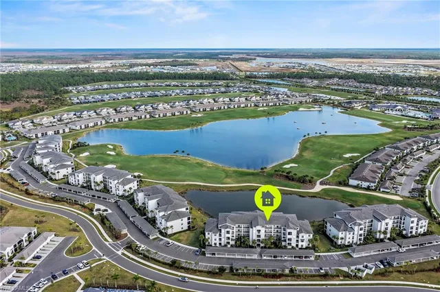 an aerial view of a pool patio swimming pool and outdoor seating