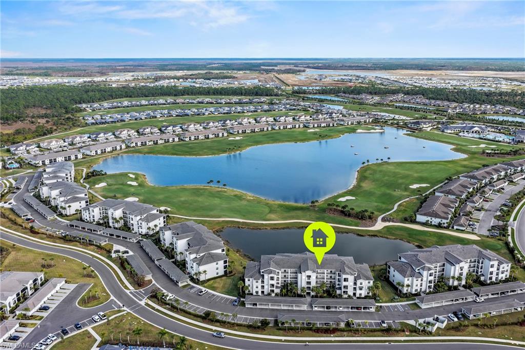 43993 Boardwalk Loop, Unit 1915 Babcock Ranch, FL 33982 - Photo 1 of 26 an aerial view of a pool patio swimming pool and outdoor seating
