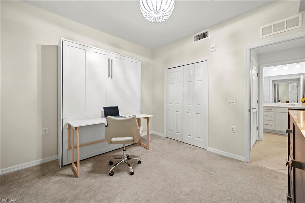 43993 Boardwalk Loop, Unit 1915 Babcock Ranch, FL 33982 - Photo 15 of 26 a view of a workspace with furniture and a window