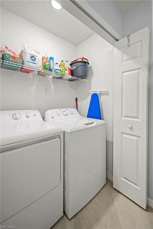 43993 Boardwalk Loop, Unit 1915 Babcock Ranch, FL 33982 - Photo 18 of 26 a utility room with dryer and washer