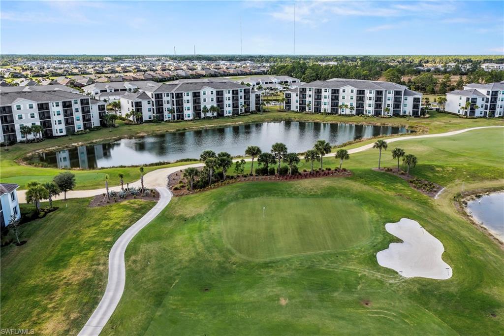 43993 Boardwalk Loop, Unit 1915 Babcock Ranch, FL 33982 - Photo 23 of 26 an aerial view of residential houses with outdoor space and lake view