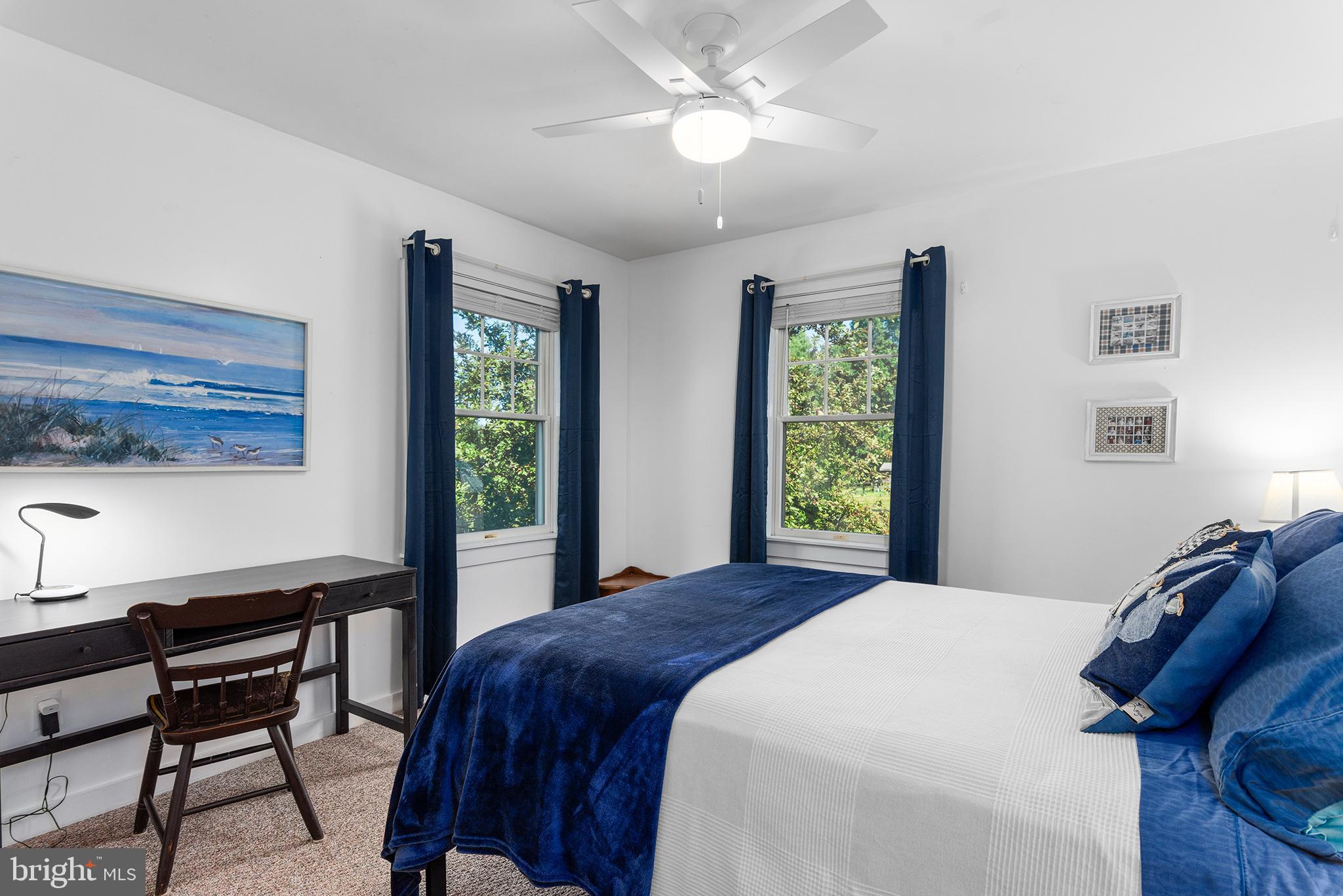 137 Elk Ranch Park Road Elkton, MD 21921 - Photo 18 of 52 a bedroom with a bed window and a desk