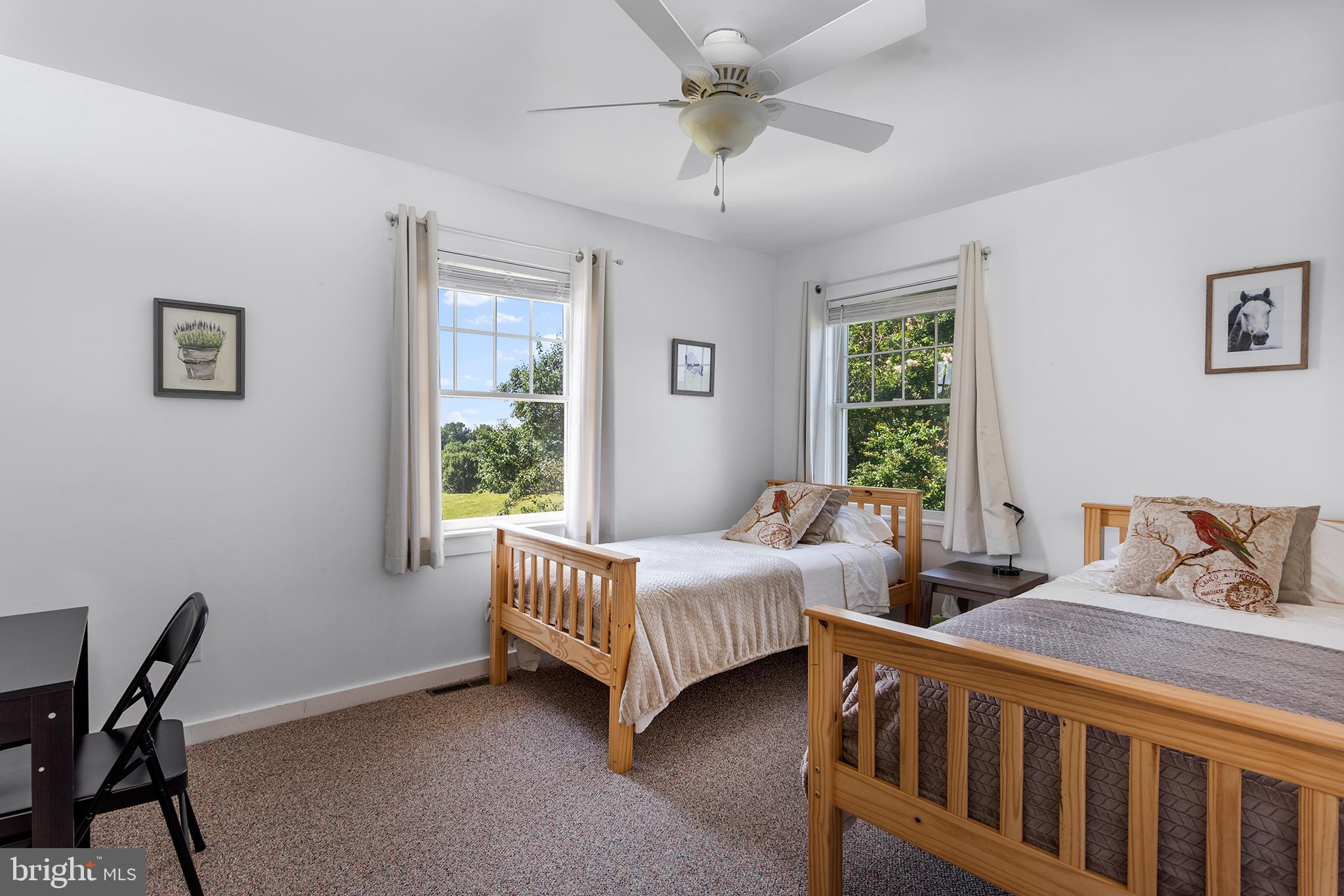 137 Elk Ranch Park Road Elkton, MD 21921 - Photo 19 of 52 a bedroom with a bed next to a window
