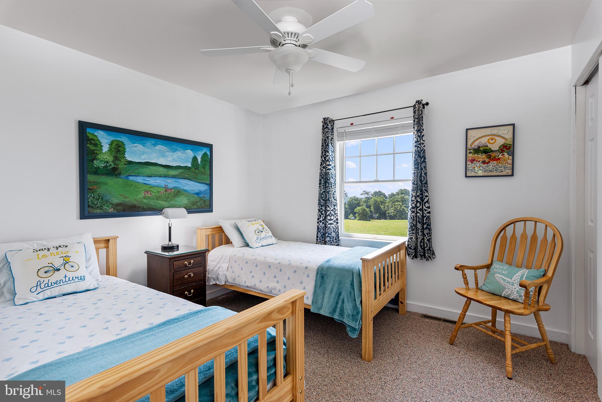 137 Elk Ranch Park Road Elkton, MD 21921 - Photo 20 of 52 a bedroom with 2 bed table chair and a window