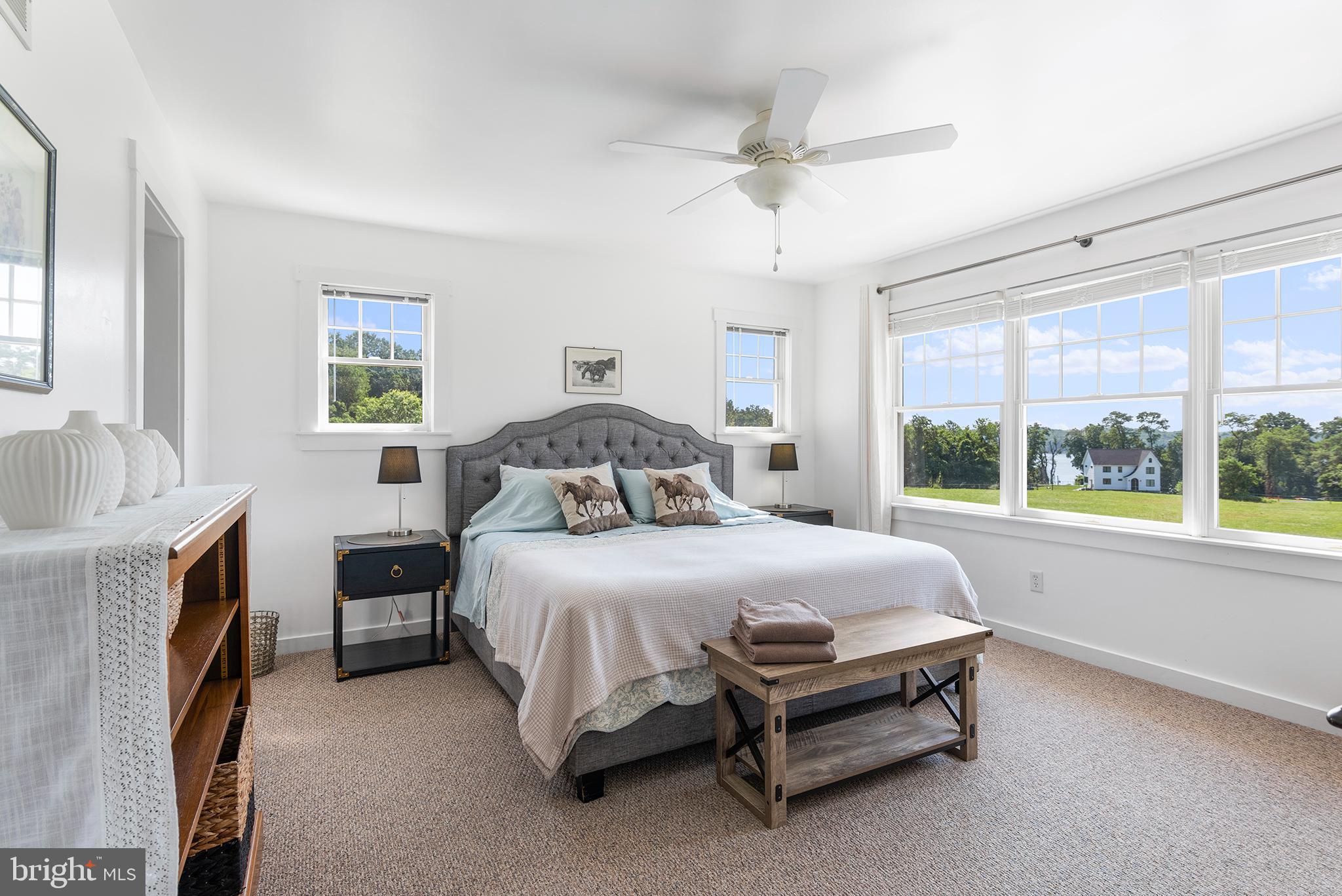 137 Elk Ranch Park Road Elkton, MD 21921 - Photo 22 of 52 a bedroom with a bed and a fireplace