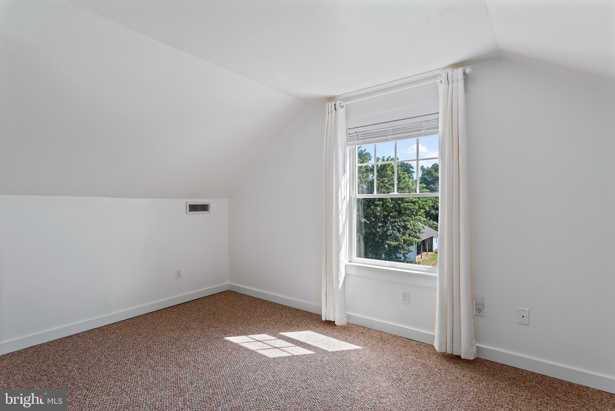 137 Elk Ranch Park Road Elkton, MD 21921 - Photo 24 of 52 a view of an empty room with a window
