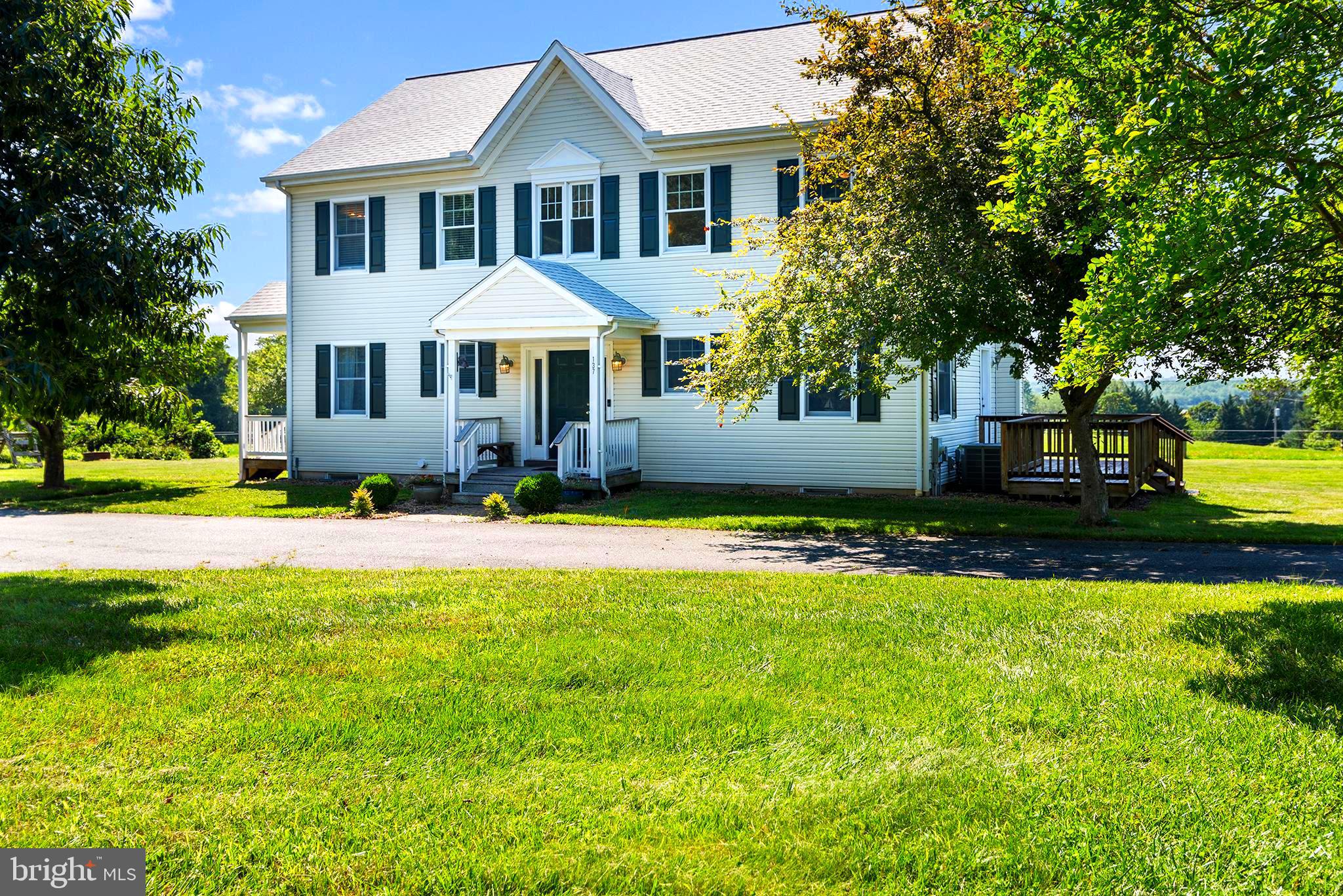137 Elk Ranch Park Road Elkton, MD 21921 - Photo 3 of 52 a front view of a house with garden