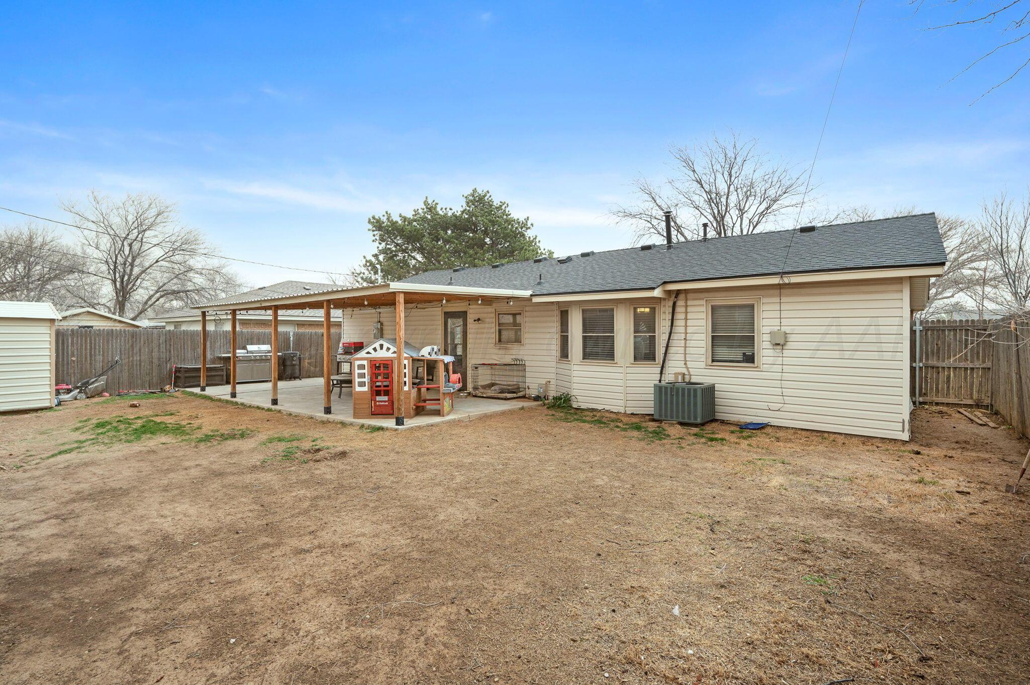 5326 Allen Street Amarillo, TX 79110 - Photo 16 of 17 front view of a house with a patio