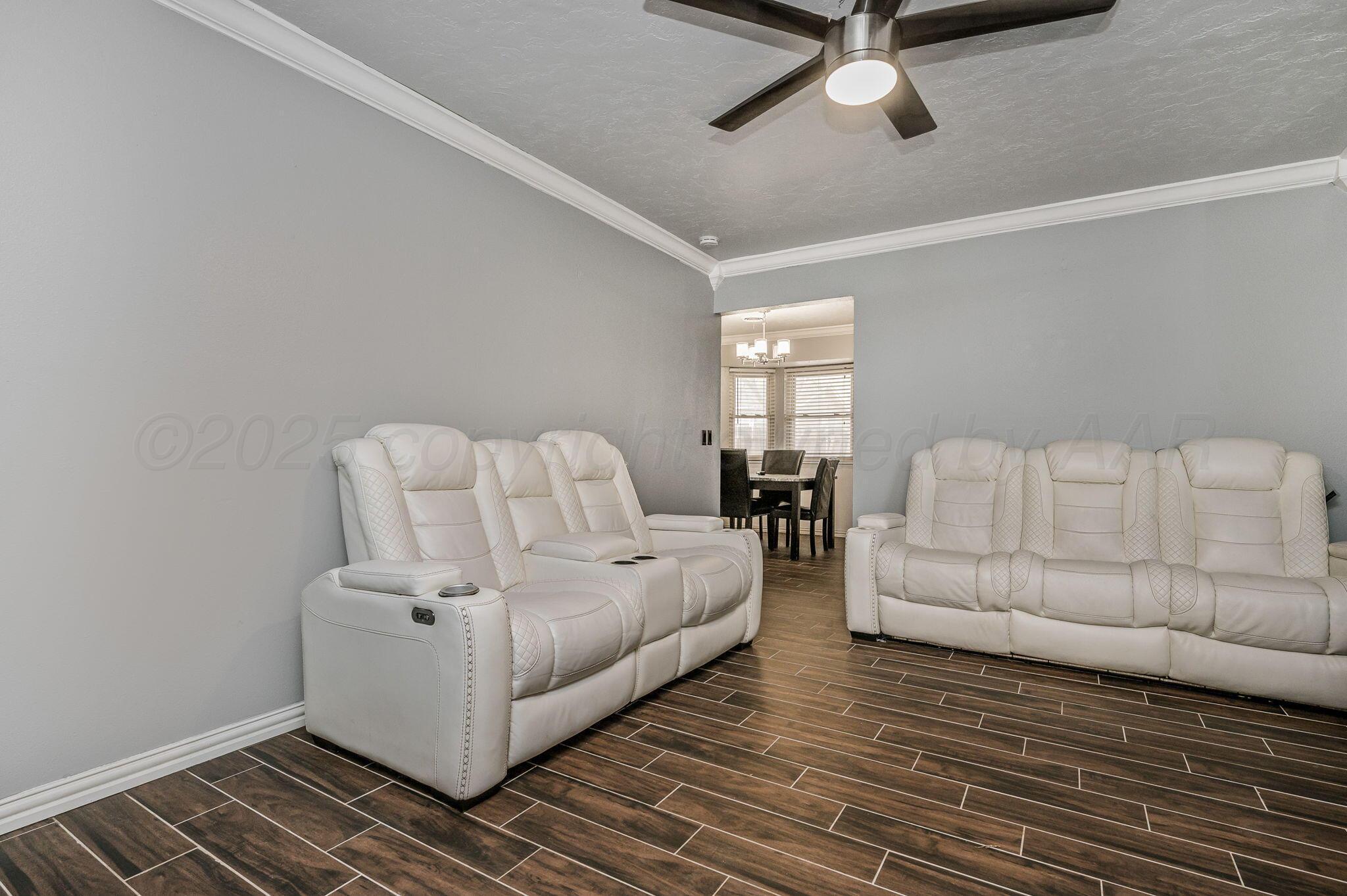 5326 Allen Street Amarillo, TX 79110 - Photo 2 of 17 a living room with furniture and a rug
