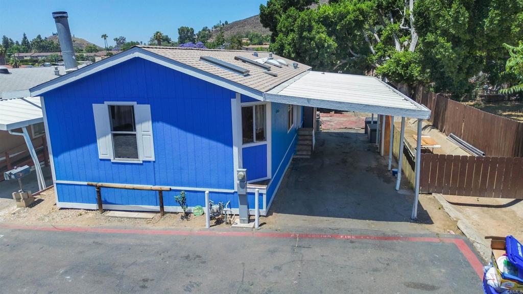 12044 Royal Road, Unit 121 El Cajon, CA 92021 - Photo 25 of 26 a terrace with outdoor seating and city view