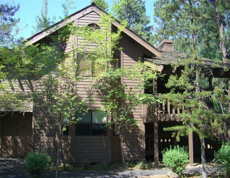 57395 Beaver Ridge Loop, Unit 40 A1 Sunriver, OR 97707 - Photo 1 of 25 a front view of a house with a yard