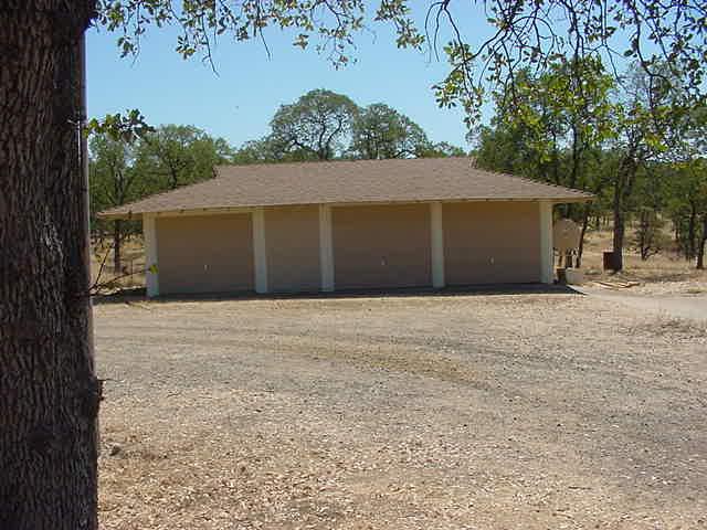 8890 Bass Pond Road Palo Cedro, CA 96073 - Photo 13 of 23 Garage