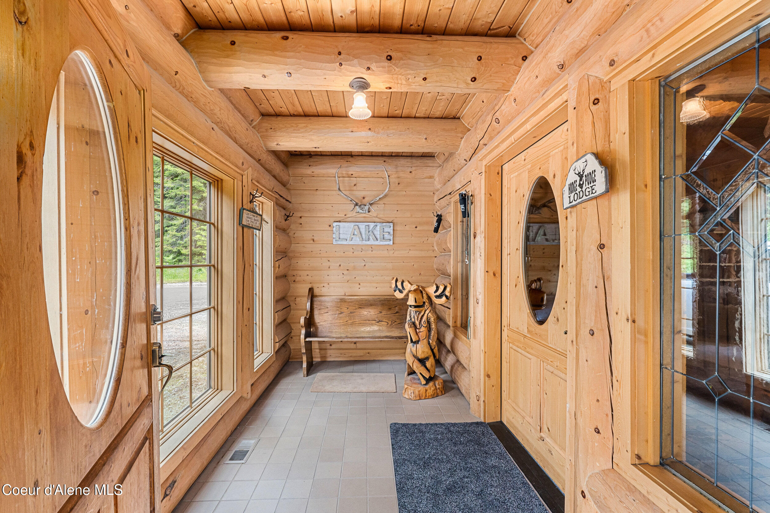 287 Cougar Run Road Priest River, ID 83856 - Photo 10 of 56 Sun room entrance
