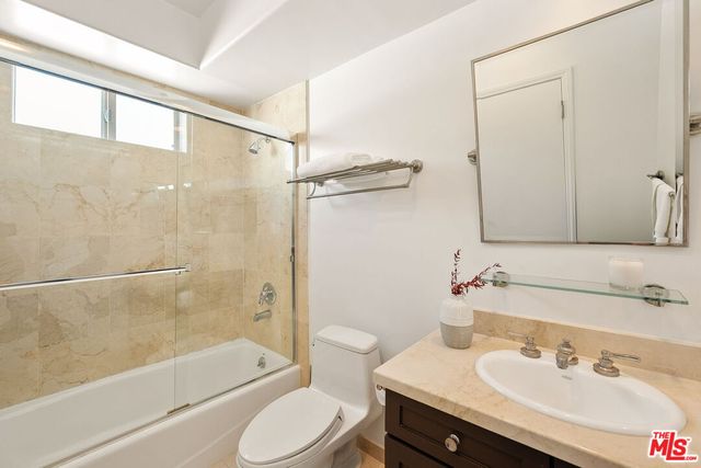 a living room with furniture and window