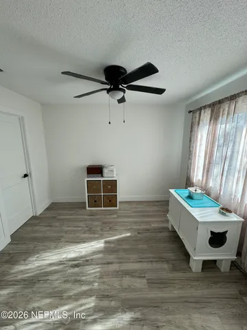 a room with furniture and window