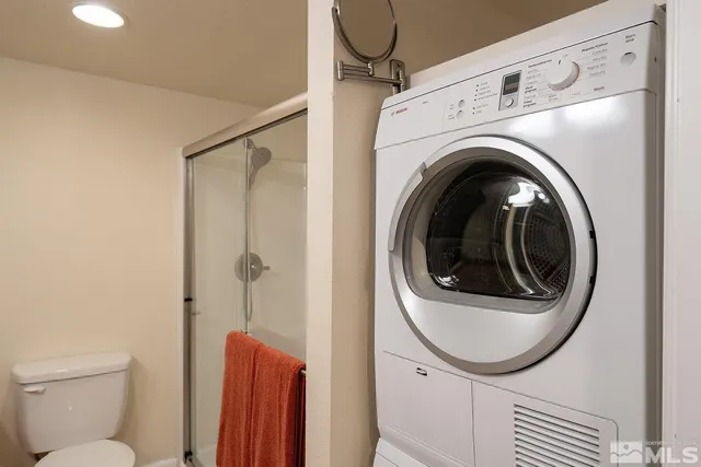 a bathroom with a toilet and a sink
