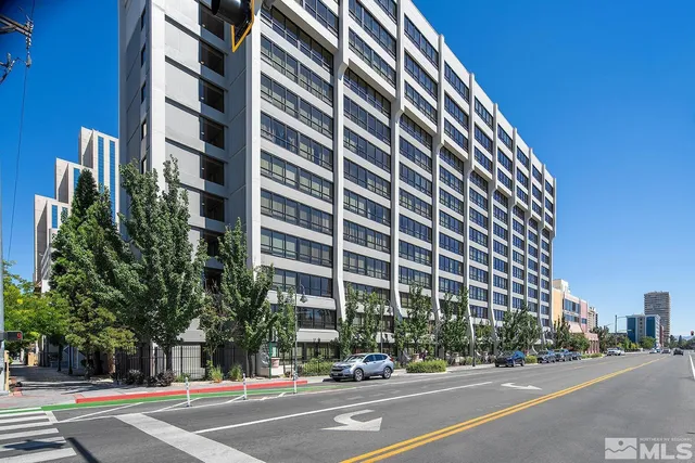 a view of a building with a street