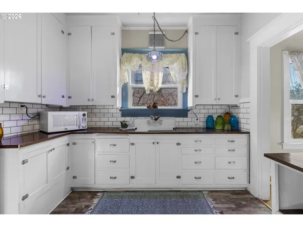 a view of cabinets and window