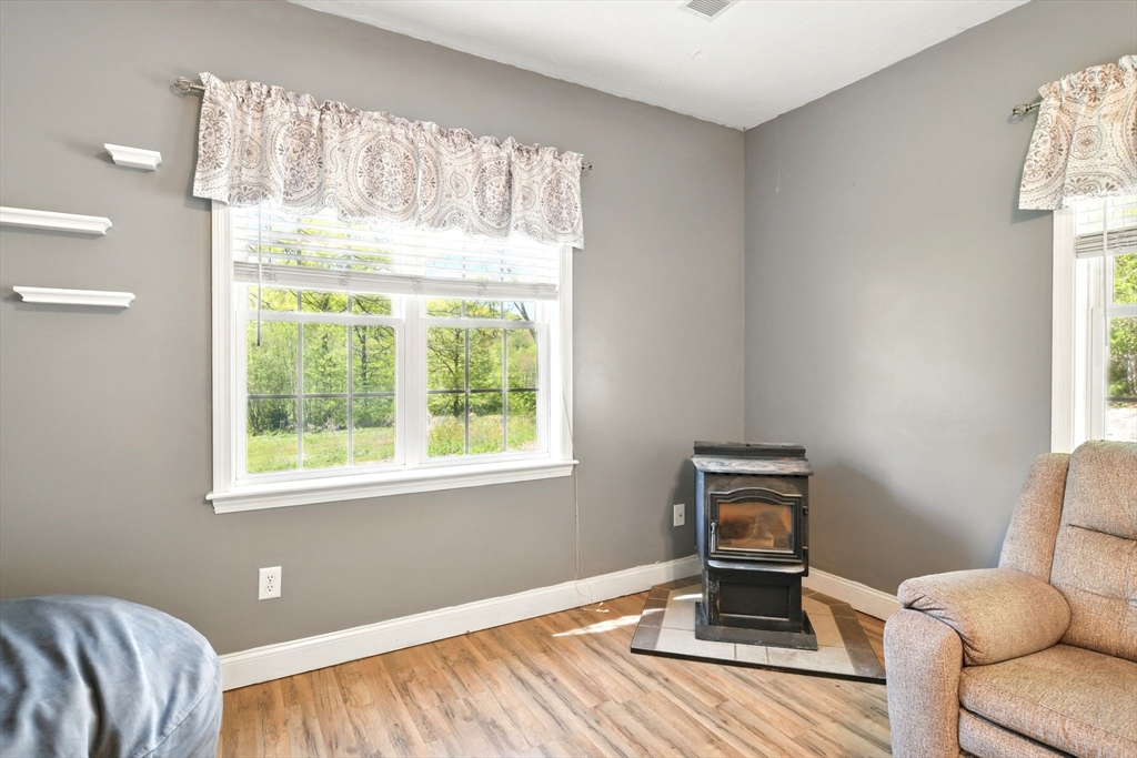 28 Ayers Road Monson, MA 01057 - Photo 11 of 42 a living room with furniture and a window