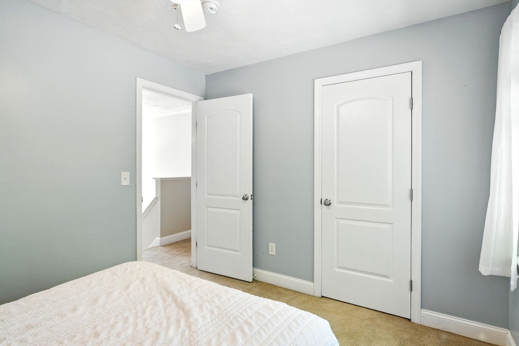 28 Ayers Road Monson, MA 01057 - Photo 31 of 42 a bedroom with a bed and hallway