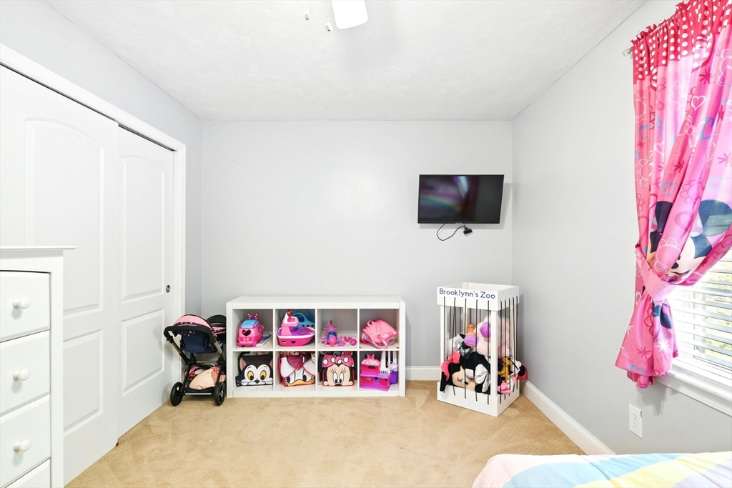 28 Ayers Road Monson, MA 01057 - Photo 35 of 42 a children room with toys and a flat screen tv