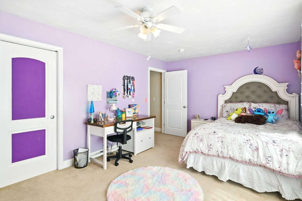 28 Ayers Road Monson, MA 01057 - Photo 38 of 42 a bedroom with a bed and a desk