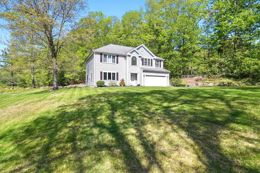 28 Ayers Road Monson, MA 01057 - Photo 4 of 42 a house view with a garden space
