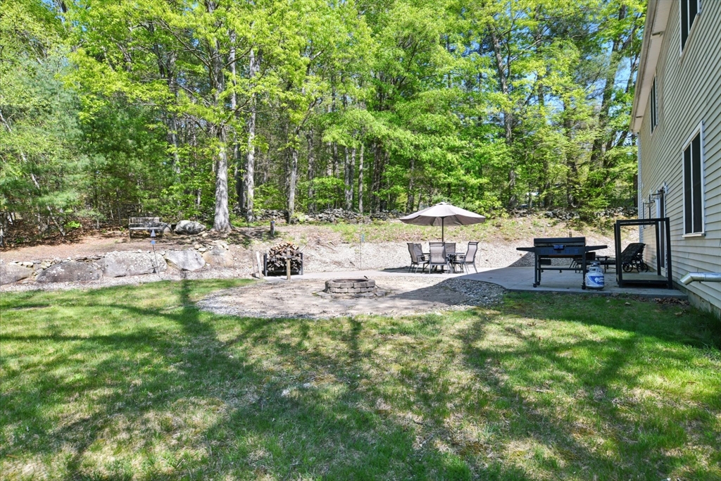 28 Ayers Road Monson, MA 01057 - Photo 41 of 42 a view of pool with lawn chairs and large trees