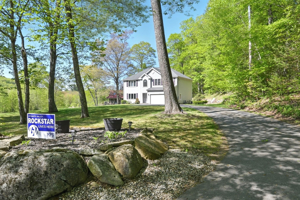 28 Ayers Road Monson, MA 01057 - Photo 5 of 42 a view of a house with a yard
