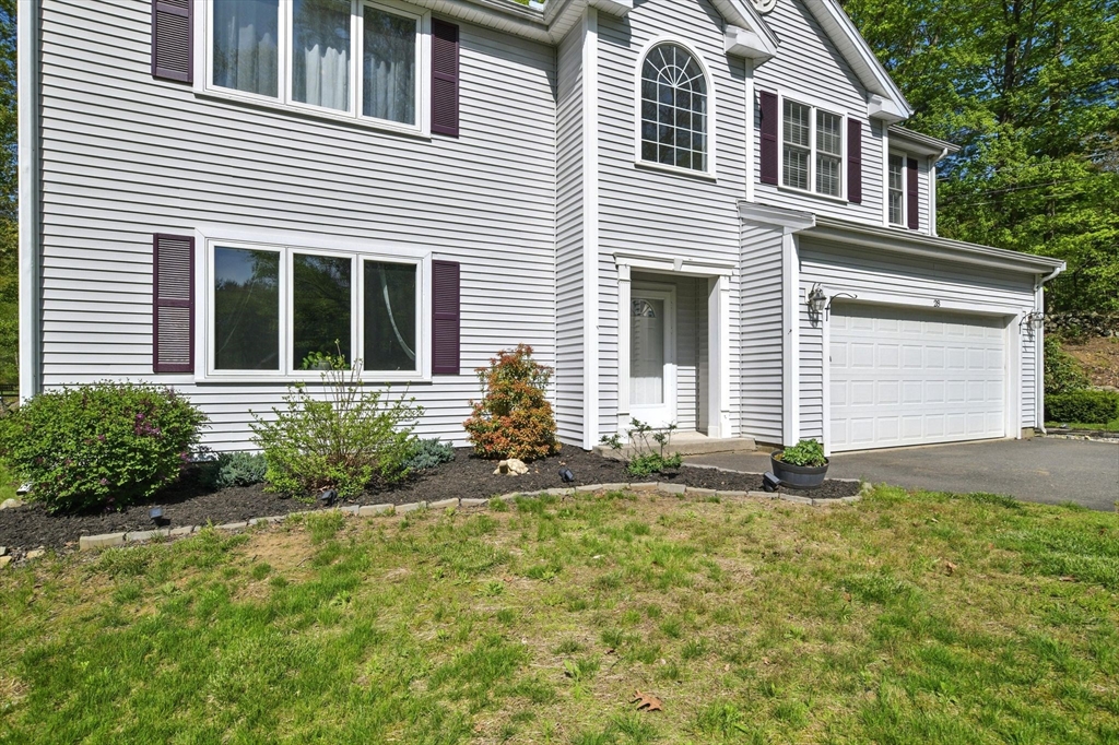 28 Ayers Road Monson, MA 01057 - Photo 6 of 42 a front view of a house with garden