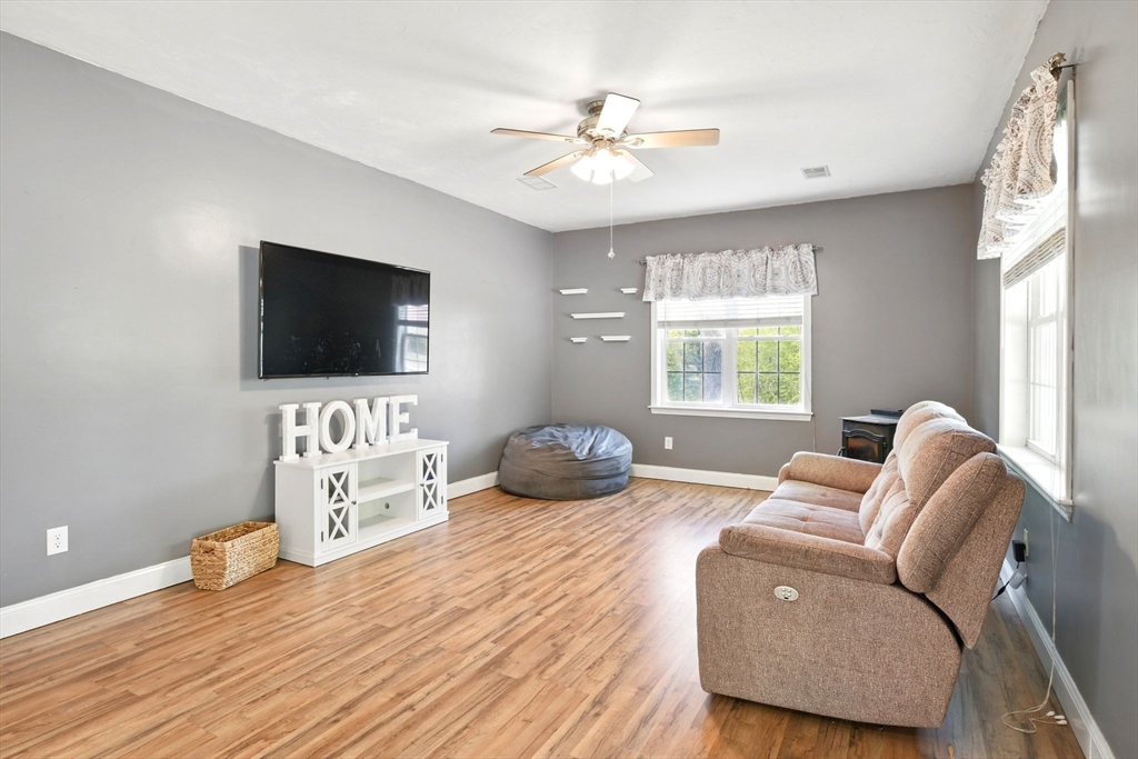 28 Ayers Road Monson, MA 01057 - Photo 9 of 42 a bedroom with furniture and a flat screen tv