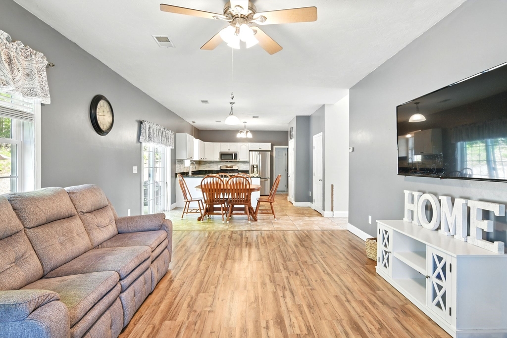 28 Ayers Road Monson, MA 01057 - Photo 10 of 42 a living room with furniture and a wooden floor