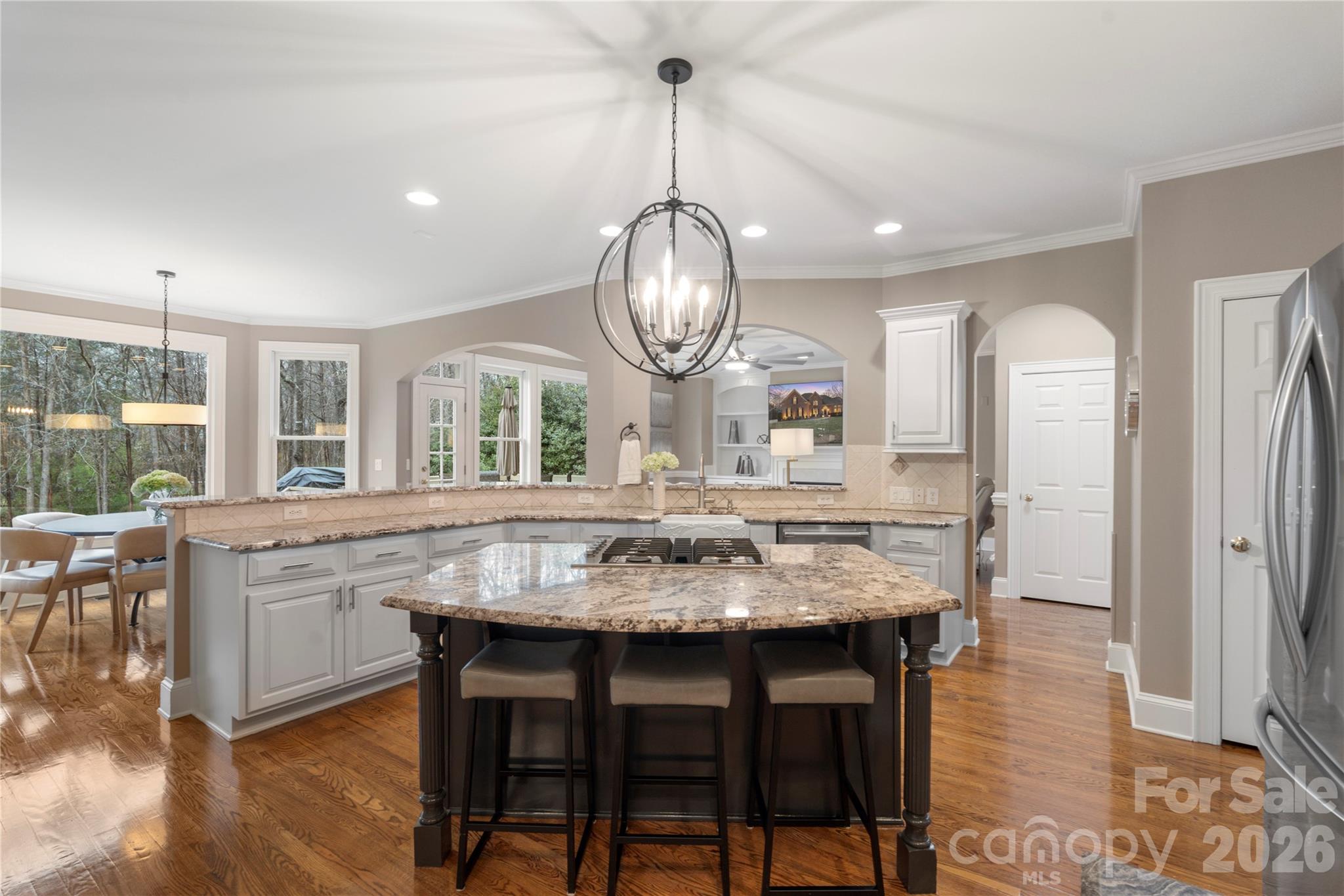 1716 Hickory Ridge Drive Waxhaw, NC 28173 - Photo 12 of 48 a dining table with chairs and wooden floor
