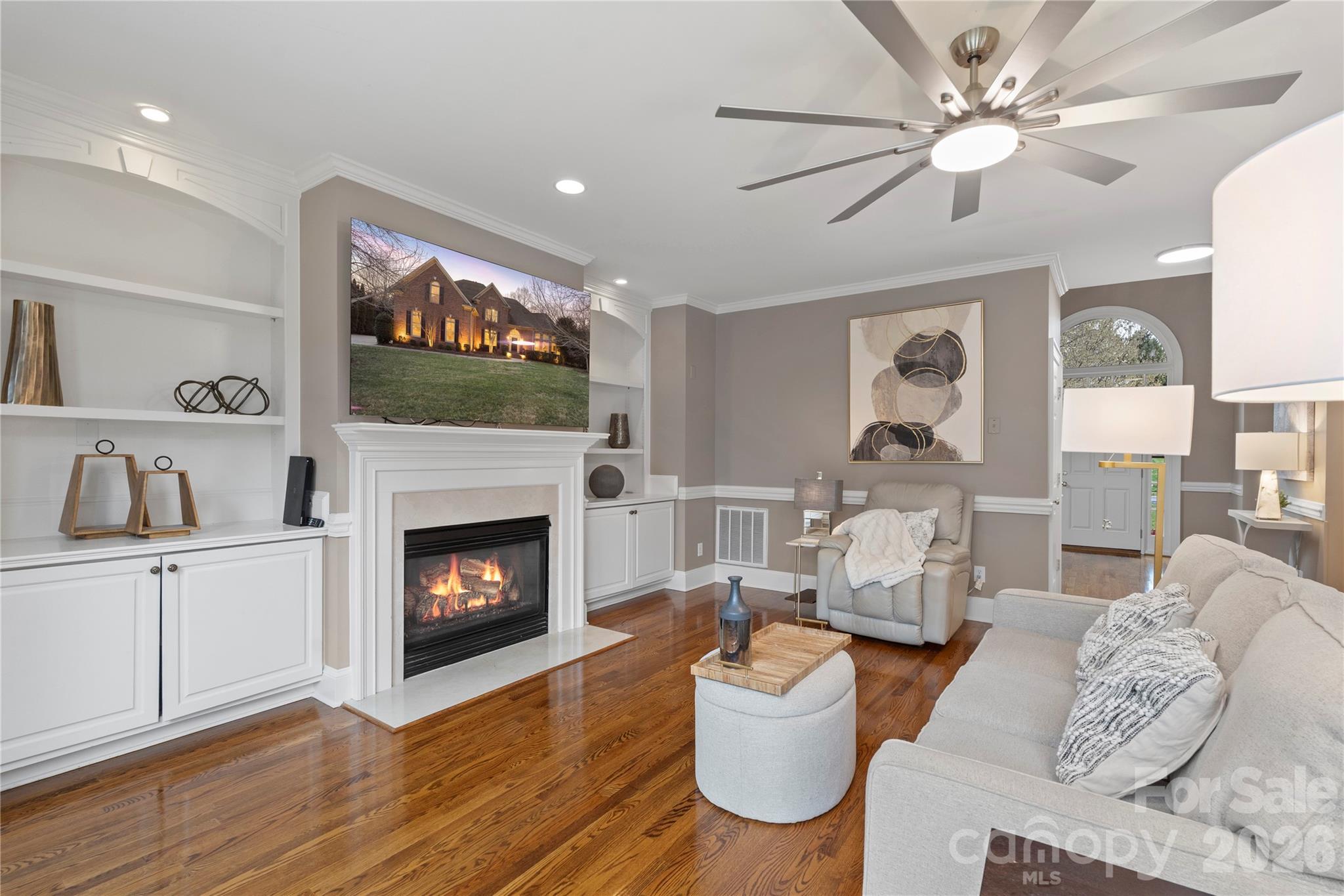 1716 Hickory Ridge Drive Waxhaw, NC 28173 - Photo 17 of 48 a living room with furniture and a fireplace