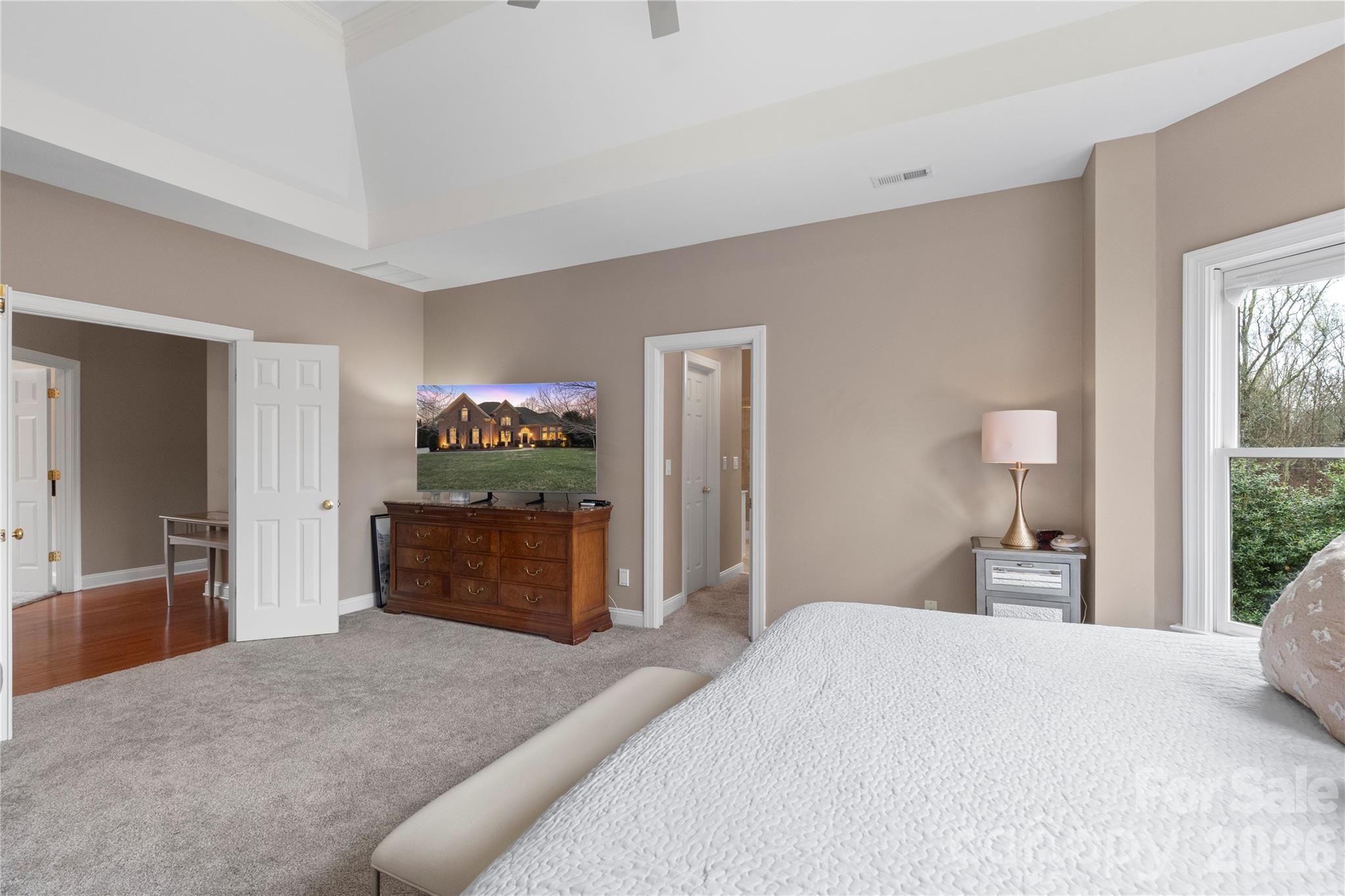 1716 Hickory Ridge Drive Waxhaw, NC 28173 - Photo 23 of 48 a bedroom with a bed and a dresser
