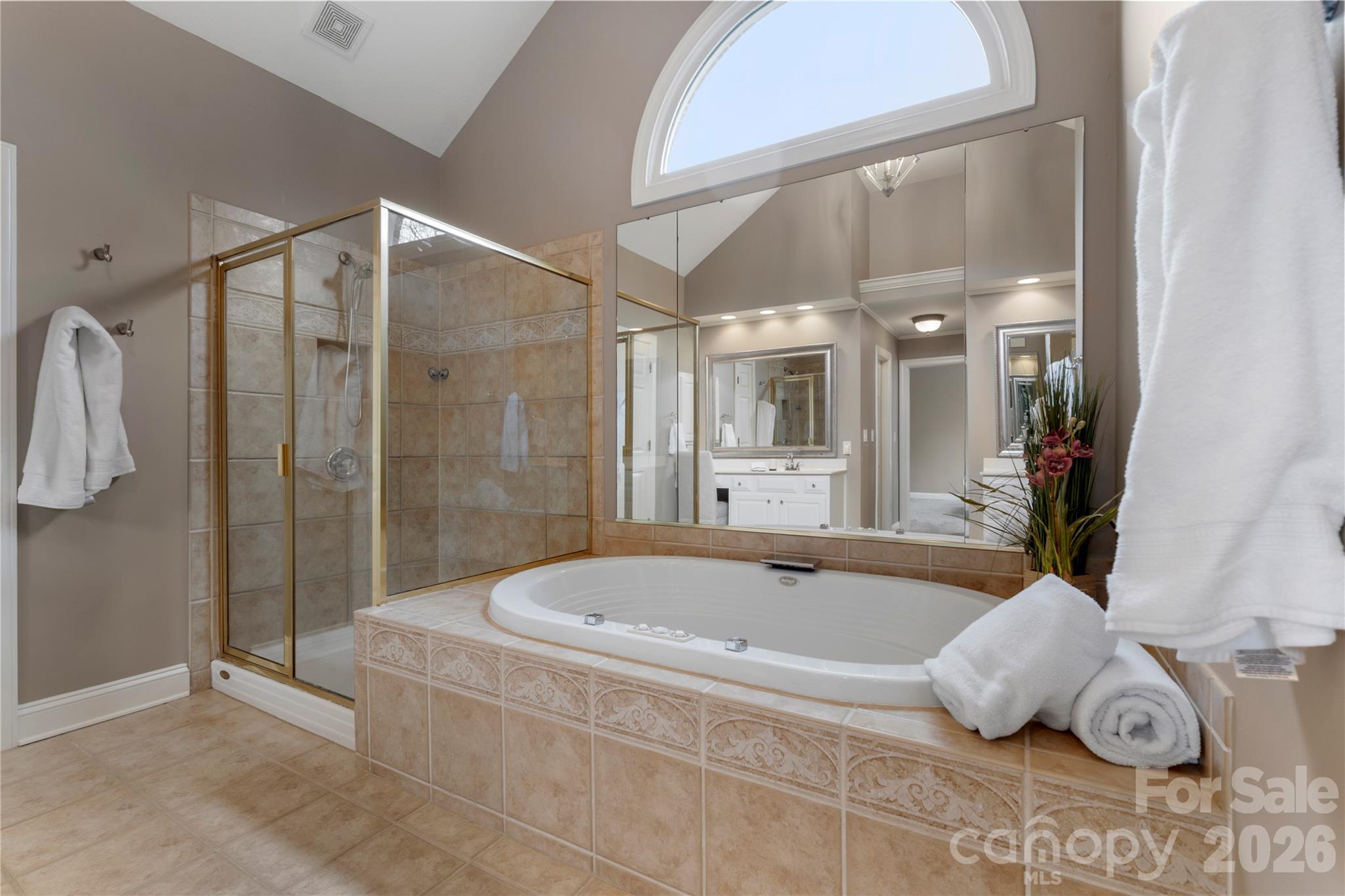 1716 Hickory Ridge Drive Waxhaw, NC 28173 - Photo 25 of 48 a bathroom with a tub and shower