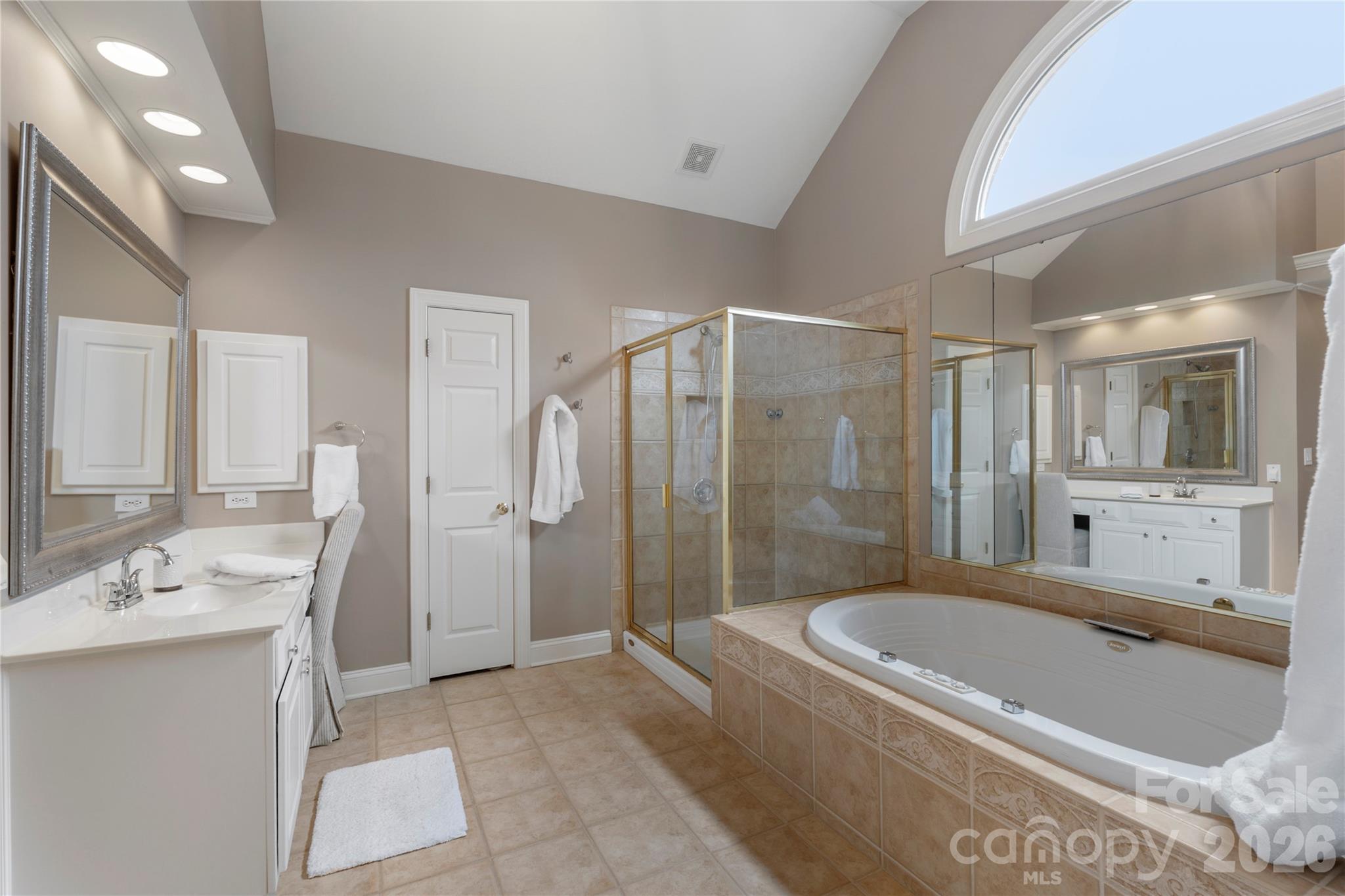 1716 Hickory Ridge Drive Waxhaw, NC 28173 - Photo 28 of 48 a bathroom with a tub a sink and shower
