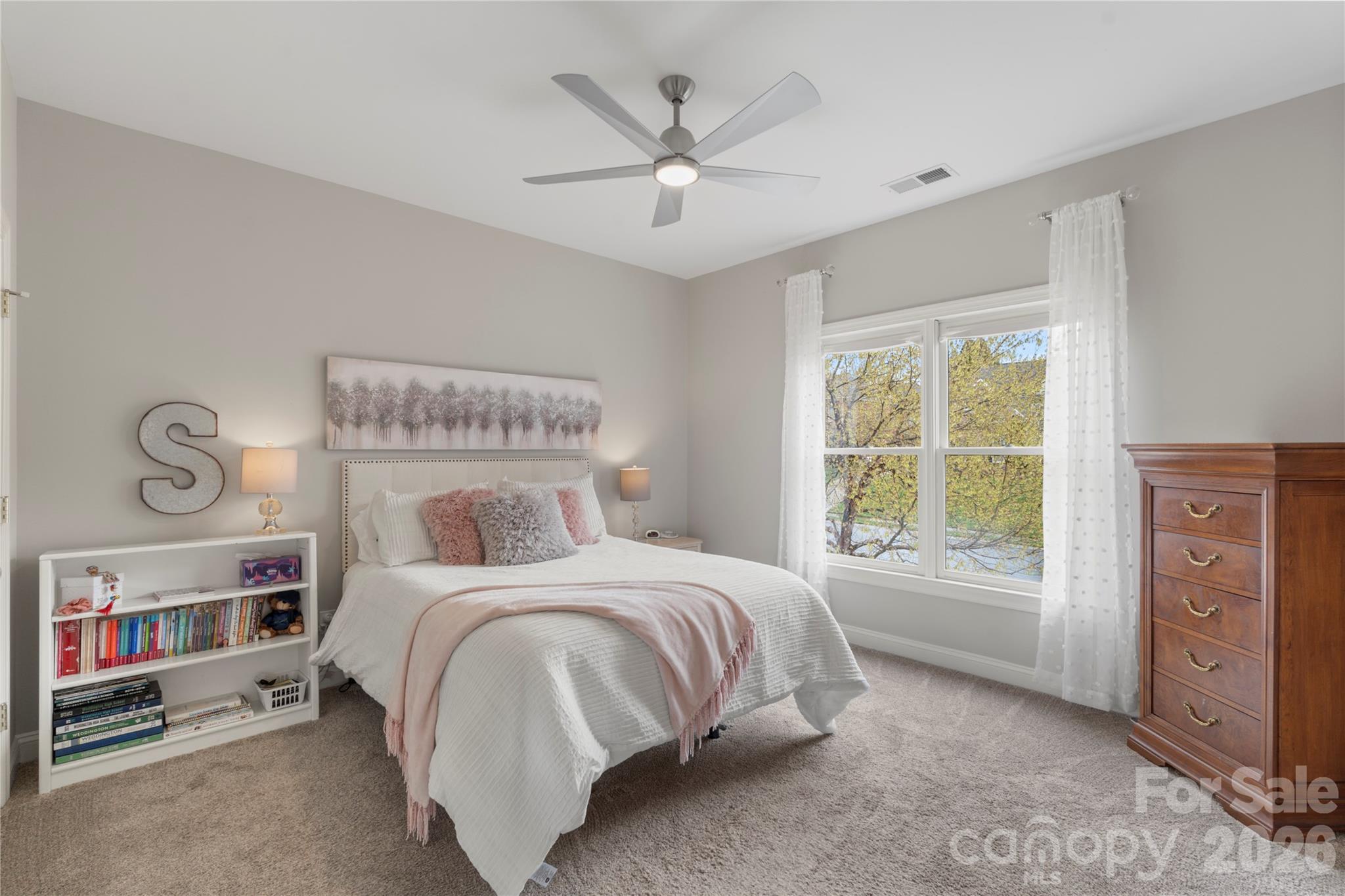 1716 Hickory Ridge Drive Waxhaw, NC 28173 - Photo 29 of 48 a bedroom with a bed a window and closet