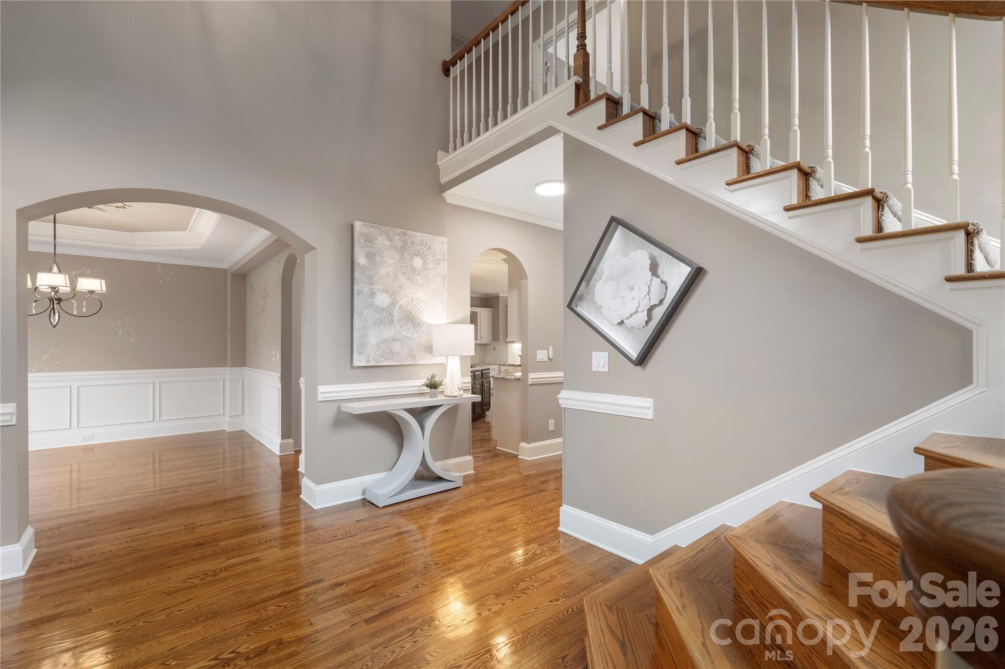 1716 Hickory Ridge Drive Waxhaw, NC 28173 - Photo 3 of 48 a view of a livingroom with wooden floor and furniture