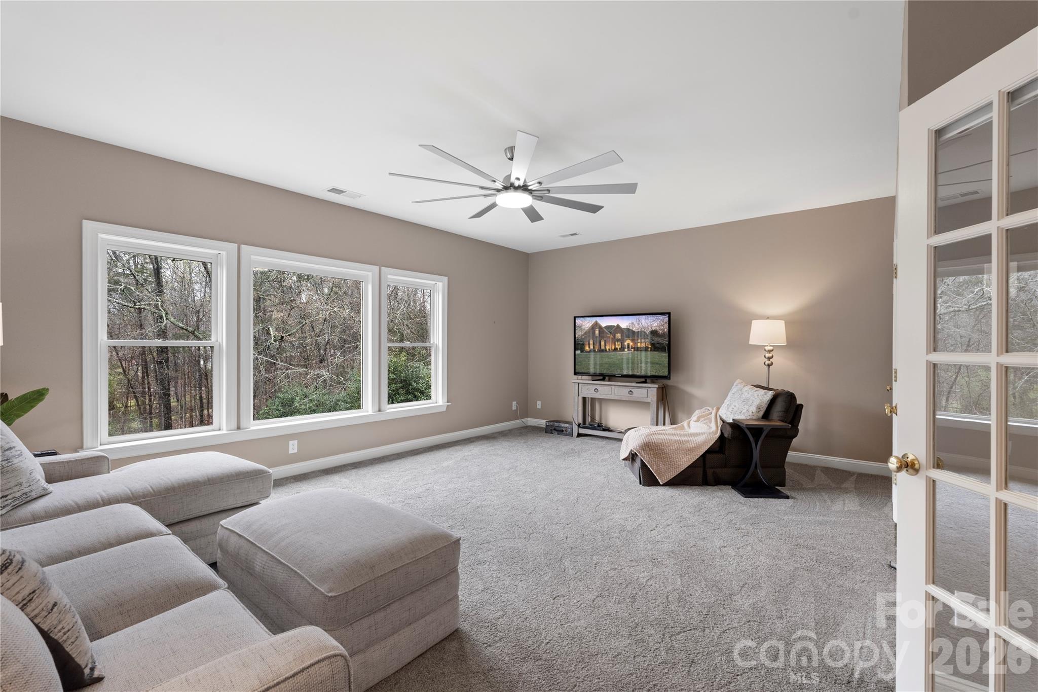 1716 Hickory Ridge Drive Waxhaw, NC 28173 - Photo 35 of 48 a living room with furniture and a large window