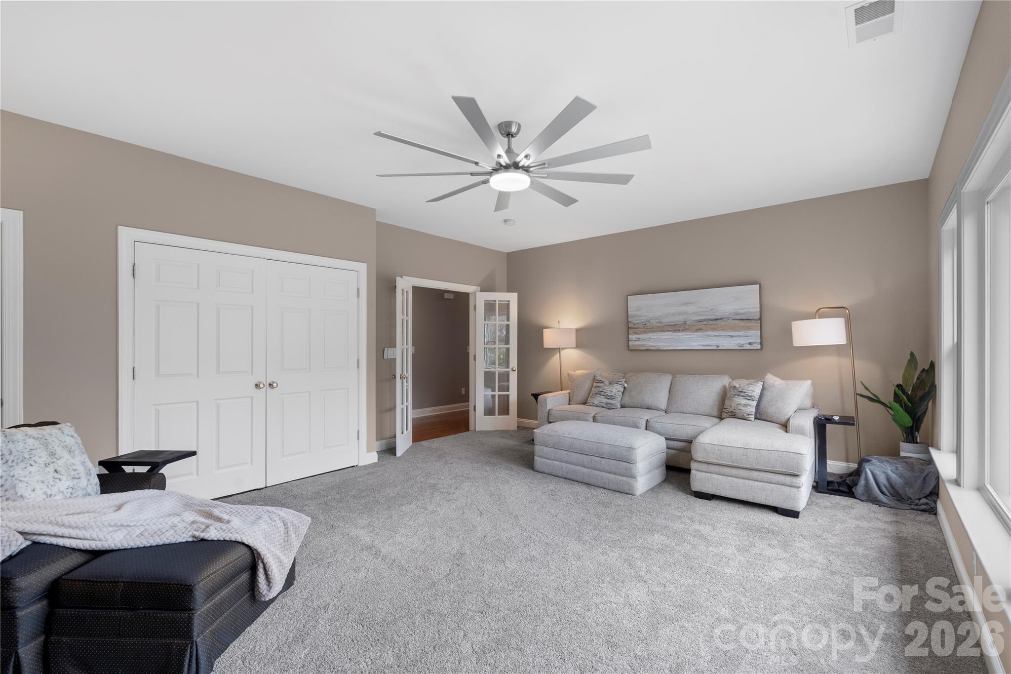 1716 Hickory Ridge Drive Waxhaw, NC 28173 - Photo 36 of 48 a bedroom with bed and ceiling fan
