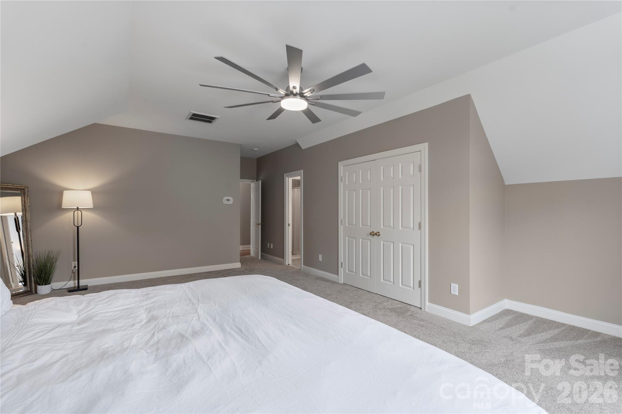 1716 Hickory Ridge Drive Waxhaw, NC 28173 - Photo 39 of 48 a view of a livingroom with a ceiling fan window and closet