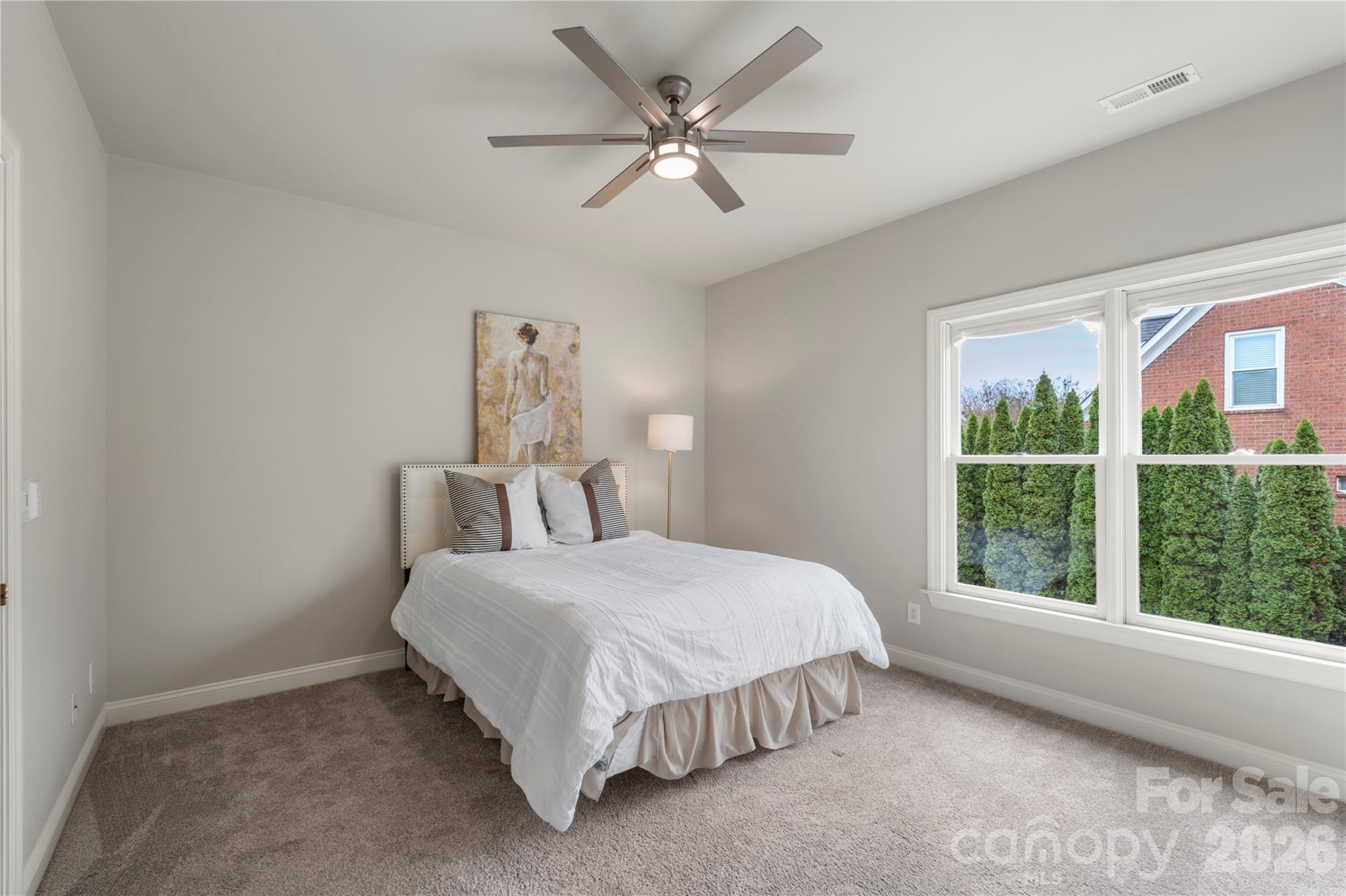 1716 Hickory Ridge Drive Waxhaw, NC 28173 - Photo 41 of 48 a bedroom with a bed and window