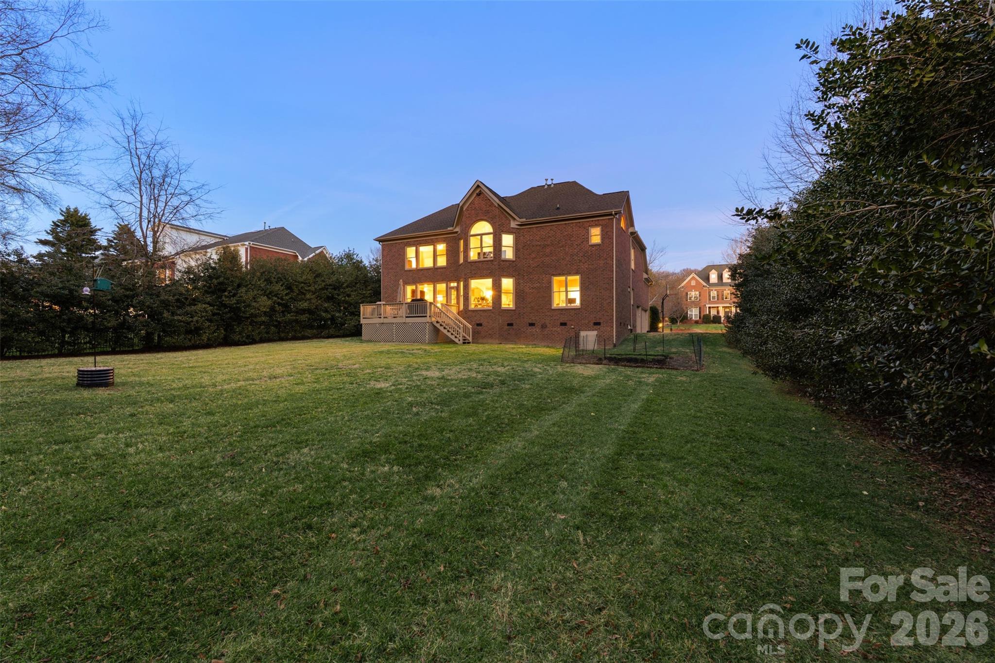 1716 Hickory Ridge Drive Waxhaw, NC 28173 - Photo 43 of 48 a view of a big house with a big yard and large trees